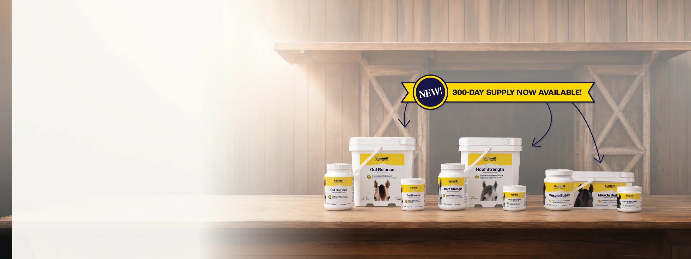 Summit's three horse powders in every size on a barn table, with a banner announcing the new 300-day supply